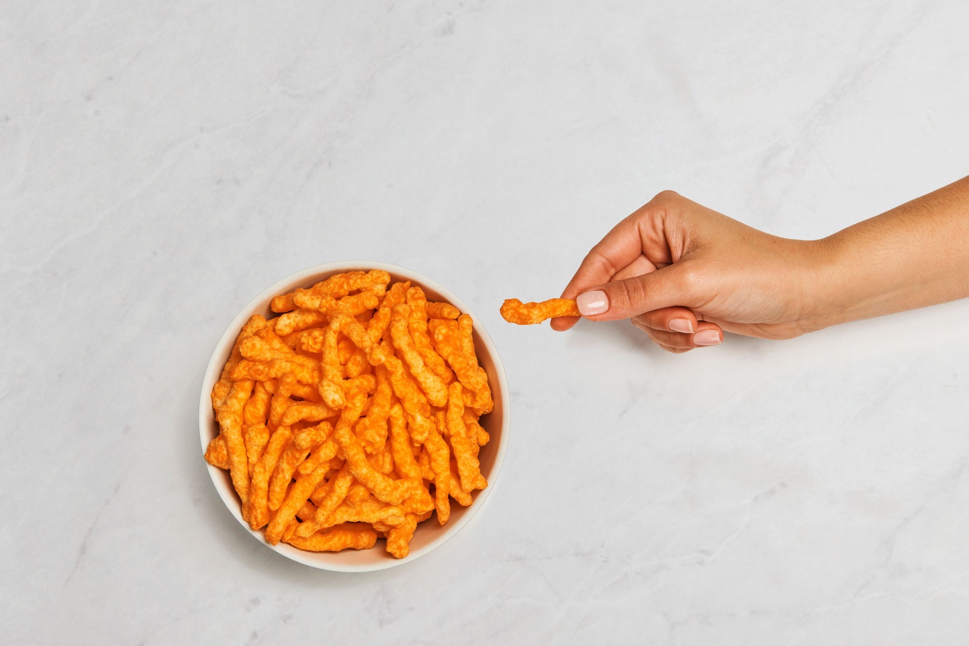 * Crunchy Cheese Flavored Snack